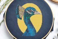 Radiant Yellow Peacock: Free Cross Stitch Delight