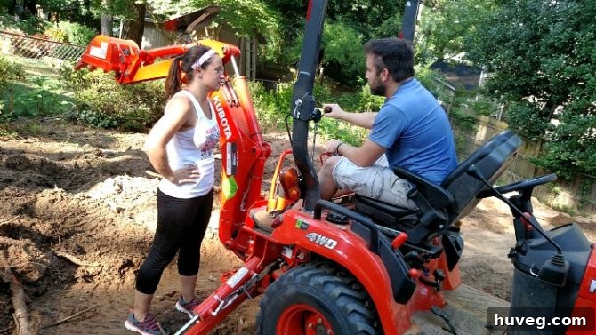 going through instructions on the backhoe