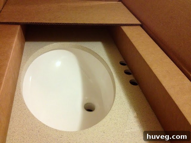 Opened box revealing a new bathroom vanity.