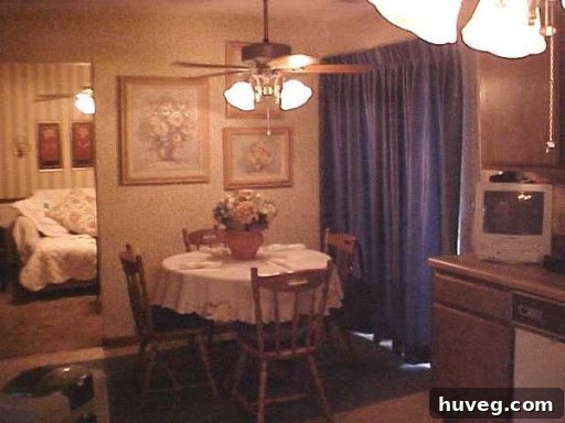 Archival before photo of the breakfast nook and kitchen area from 2009, highlighting the previous design.