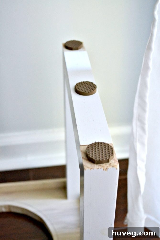I applied Scotch Gripping Pads along the bottom of both sides of my DIY no-slip dog feeder. 