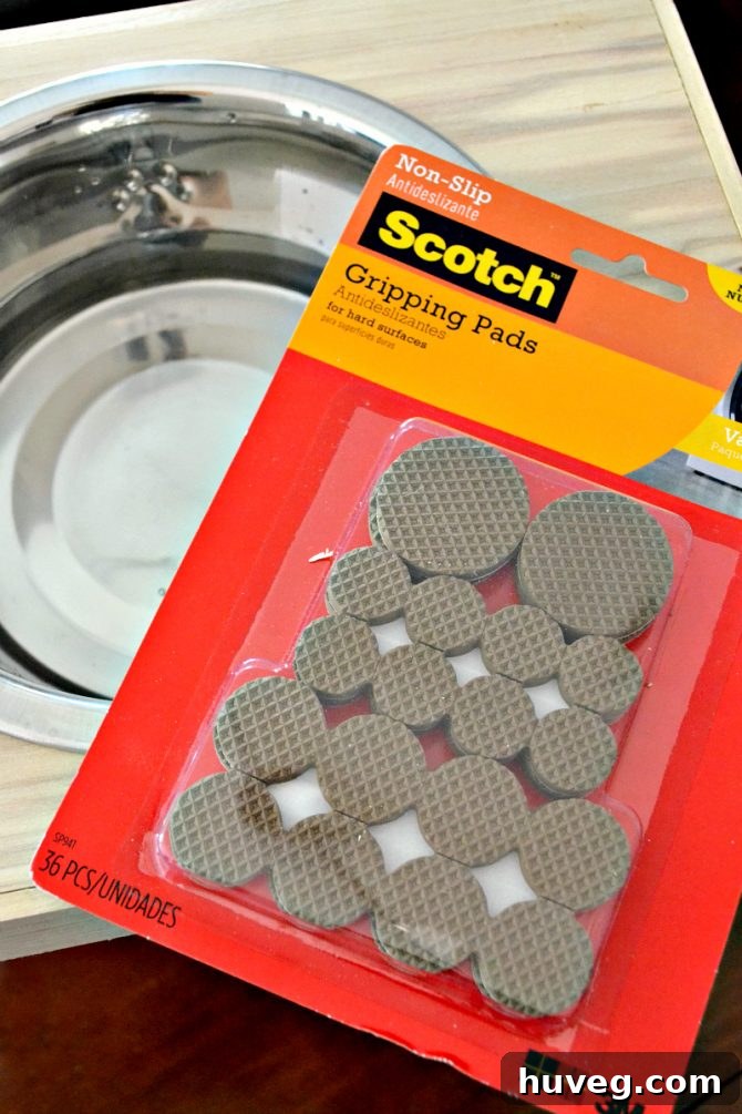 The Scotch Gripping Pads help keep this non-slip dog feeder from moving or spilling.  