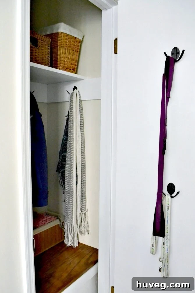 Entryway Closet Door After Painting and New Hooks