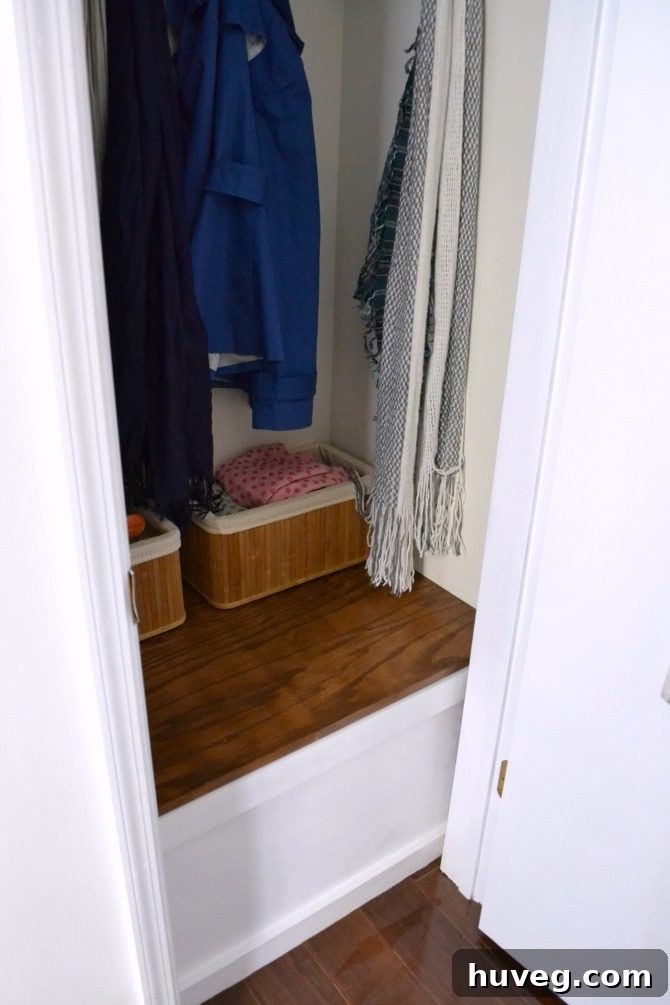 Entryway Closet Floor with New Built-in Storage After Makeover