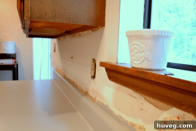 Progress shot of kitchen wallpaper removal