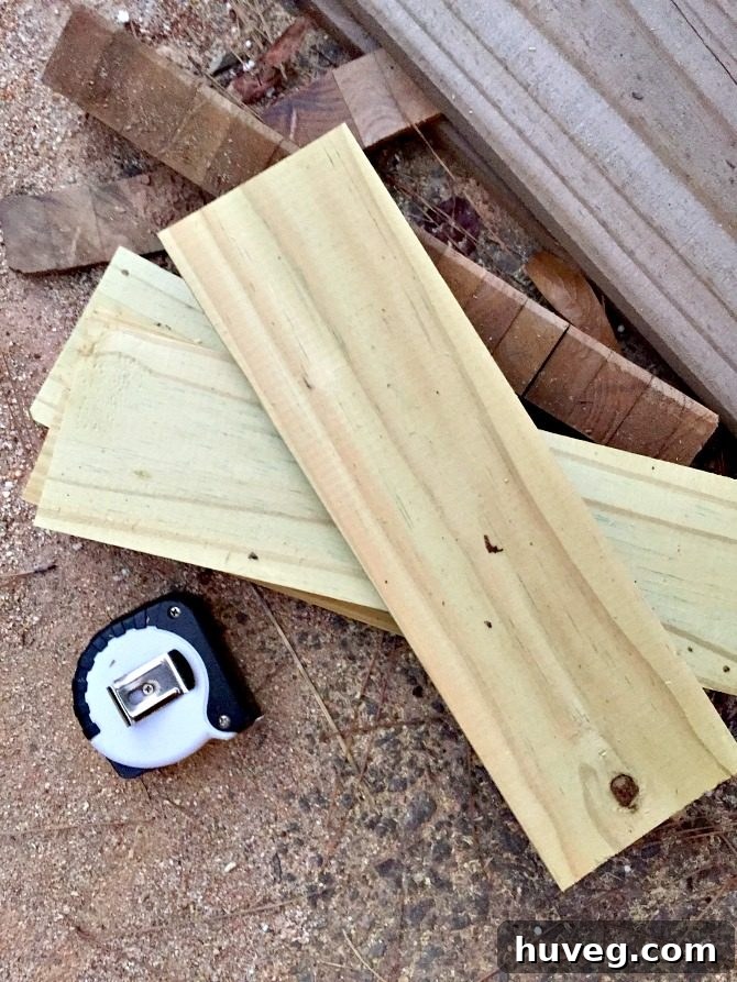 Creating custom wooden stakes from leftover scrap wood to reinforce the concrete formwork effectively