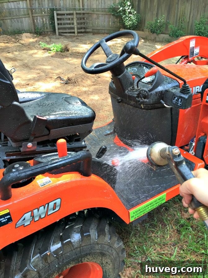 hosing-down-the-equipment