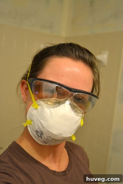 Mid-stage drywall work in the guest bathroom, showing initial mudding or taping.
