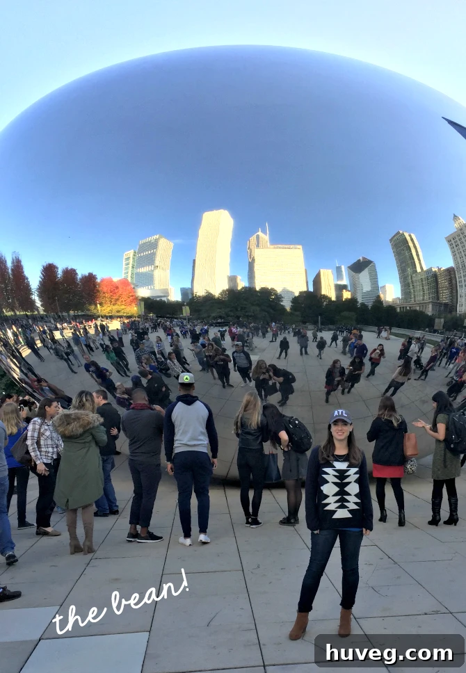Cloud Gate 'The Bean' reflecting Chicago skyline