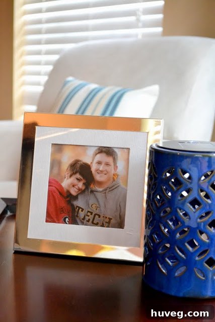 Newly painted picture frame proudly displaying a repurposed Christmas card