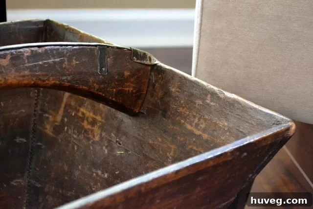 Another view of the aged wood and metal details of the rice bucket