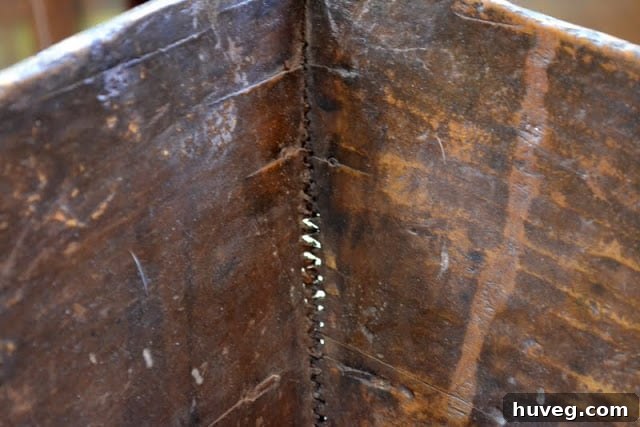 The bucket showcasing its unique texture and patina
