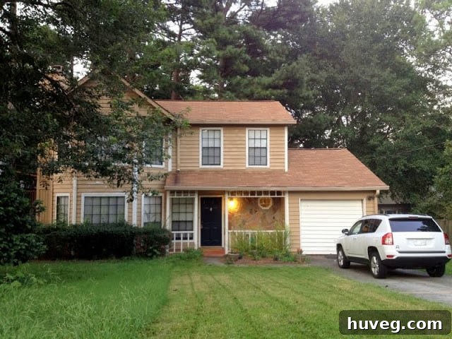 A freshly mowed and tidied front yard, showcasing improved curb appeal and a well-maintained home exterior