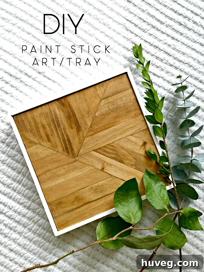 Beautifully finished DIY paint stick art piece, showcasing its potential as a decorative and functional item.