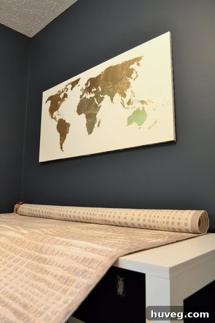 Final glimpse of the pixelated rug interacting with the gilded map art, showcasing a balanced and stylish decor.