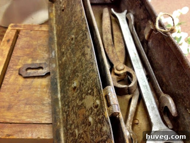 Close-up of a rustic rusty old tool box, showcasing its vintage appeal