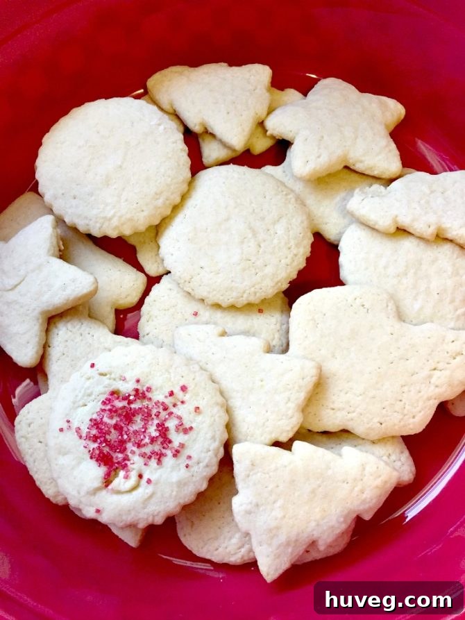 Unfrosted sugar cookies cooling on a wire rack