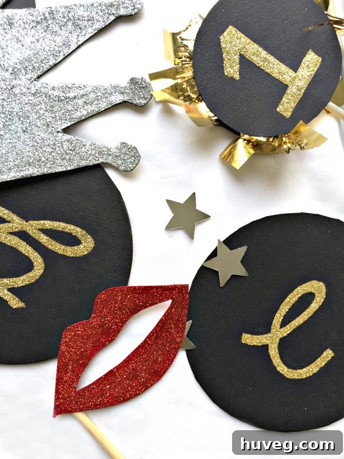 Assortment of DIY New Year's Eve decorations and photo props