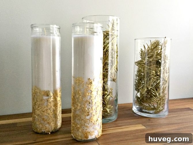 Festive centerpiece featuring candles, vases, and assorted decorative items