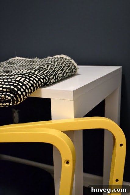 A glimpse of a yellow painted wall, indicating progress on a larger renovation project.