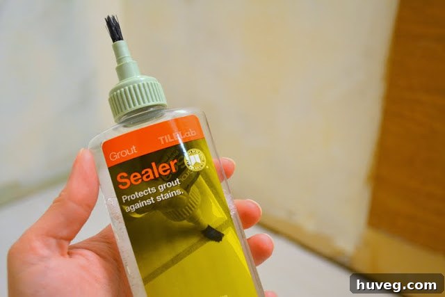 Easily sealing grout joints in a tiled floor with a brush applicator