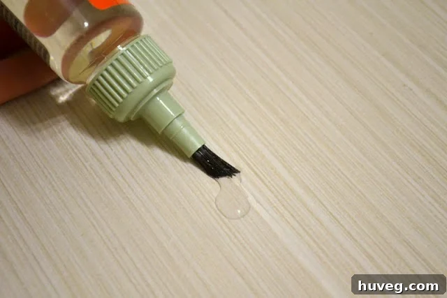 Another view of the grout sealing applicator brush in action