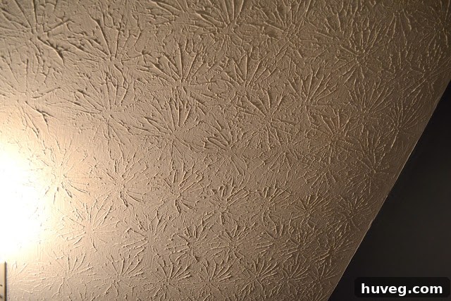 The finished ceiling after painting, showing no trace of the water stain