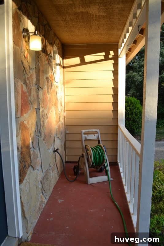 Wider shot of the red concrete slab, showing the general area of the hole