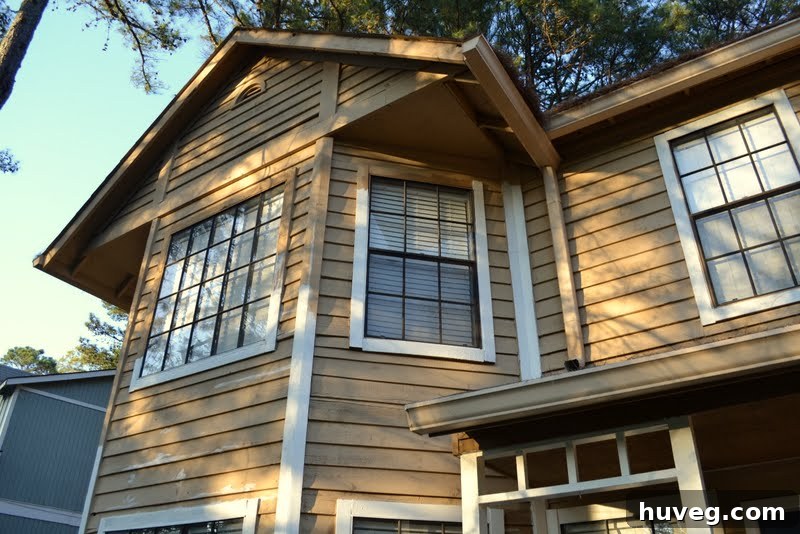 Exterior of the house showing high trim work needing completion