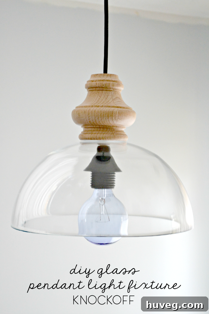DIY glass pendant light fixture, a creative knock-off project transforming everyday objects into stylish kitchen lighting.