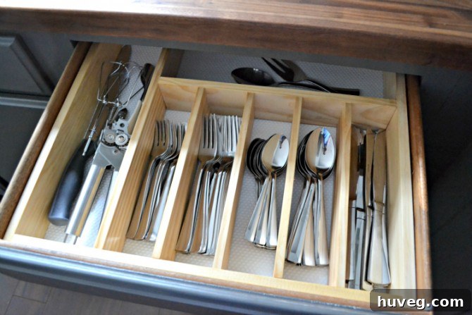 DIY kitchen drawer dividers for silverware, a smart and cost-effective organization solution, enhancing kitchen functionality.