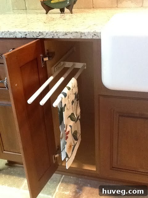 Pull out towel rack in base cabinet