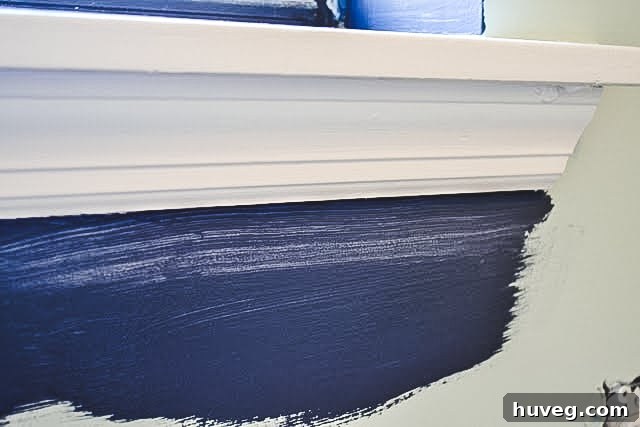 First pass of cutting in showing a slightly streaky but straight paint line along an edge