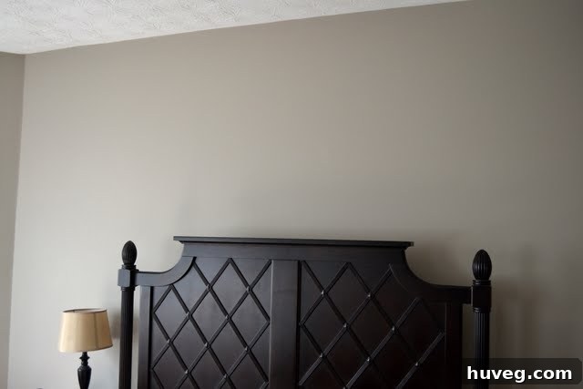 Bedroom art shopping inspiration, showing a large painting above a bed