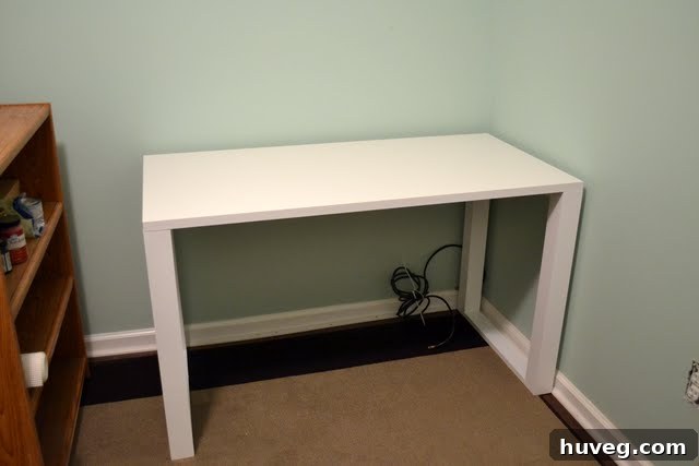 Close-up view of the sturdy and solid custom-built modern desk, highlighting its robust construction.