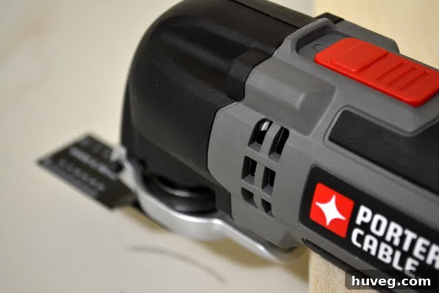 Porter Cable Oscillating tool with various attachments displayed