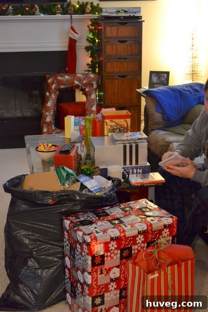A collection of Christmas gifts including a book, T-shirt, and new tools like sawhorses, representing personal interests.