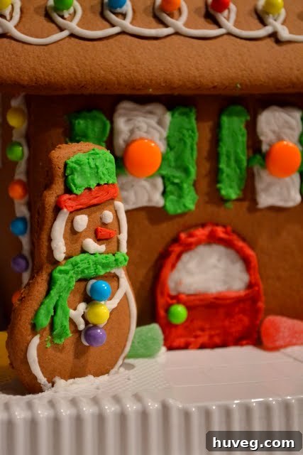 Gingerbread house kit contents laid out, showing pre-baked gingerbread walls and roof