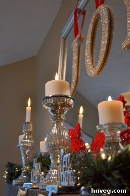 Christmas Mantel Decor with 'JOY' Letters, Mirror, and Poinsettias