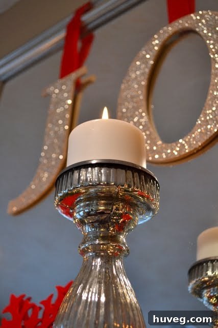Christmas Mantel with Candles, Gold Accents, and Festive Ornaments