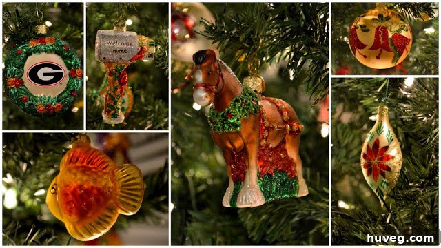 A collection of vibrant Christmas tree ornaments, featuring a sparkling fire hydrant, a traditional white poinsettia, and other hand-blown glass decorations.