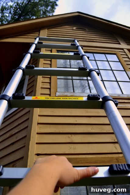 Extend-A-Step telescoping ladder in use against a house