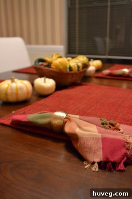 Decorative gourds arranged in a cluster on a surface