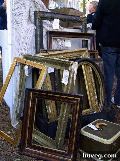 Vintage postcards and ephemera for sale at an antique booth