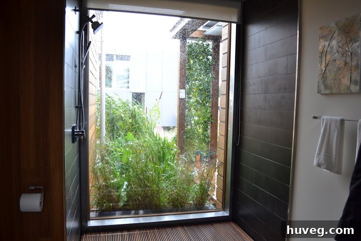 Innovative outdoor indoor sauna shower designed for greywater recycling, promoting sustainable water use in homes