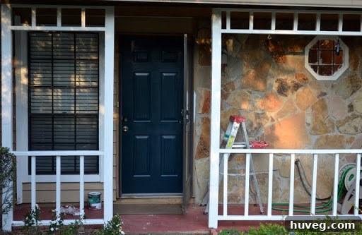 Front of house with new door color visible