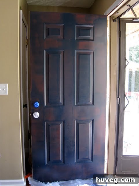First coat of paint applied on the door
