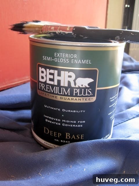 Can of Behr Premium Plus exterior paint