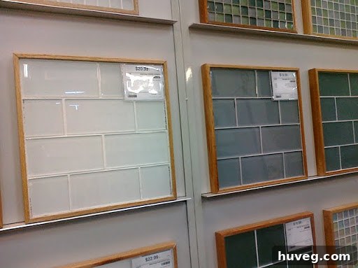 Another section of the tile showroom with different tile patterns and colors