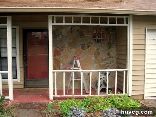 Another view of the newly painted front stoop, showcasing its improved curb appeal.